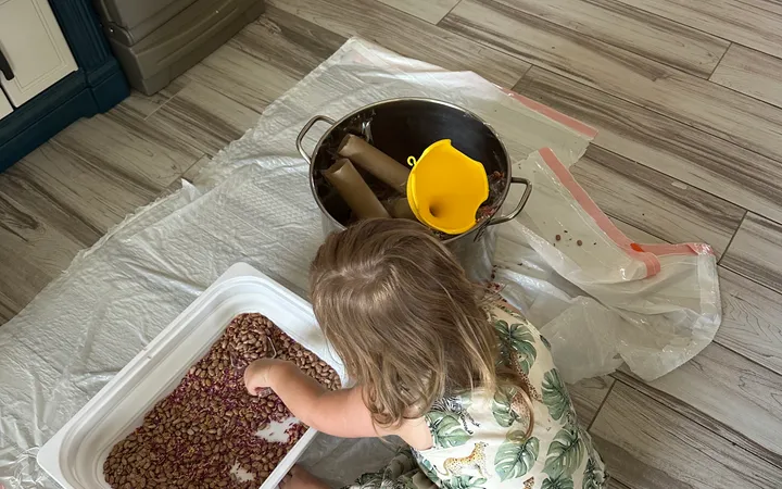 Bean Funnel: A 15-Minute Toddler Sensory Scooping Activity
