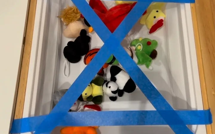 Toy Rescue with Tape: A Toddler Sensory Bin Activity (Ages 2-4)