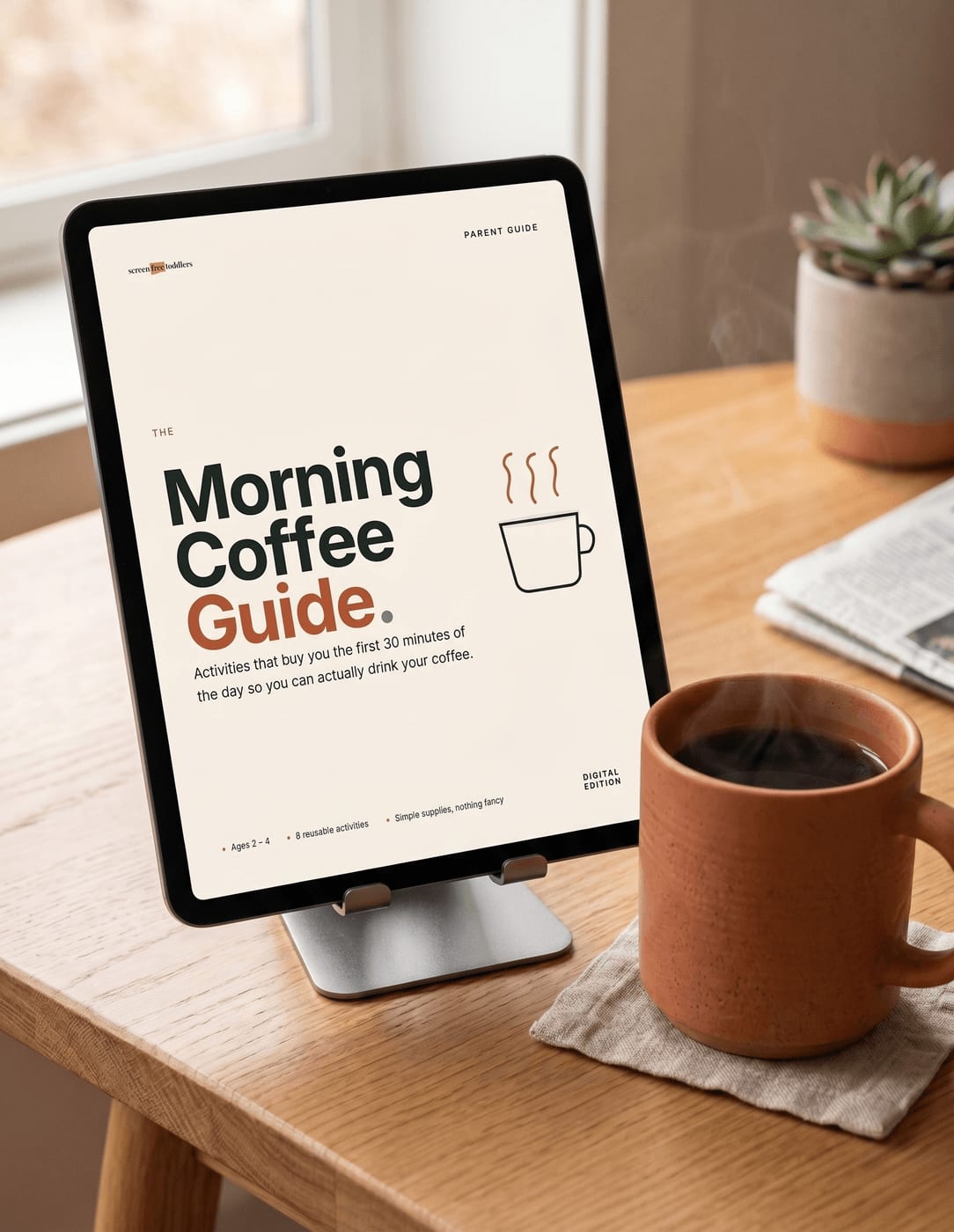 The Morning Coffee Guide PDF open on a tablet next to a coffee mug.